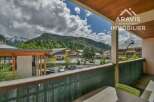 Enjoy breathtaking mountain views from this charming property.