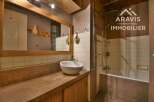 Discover this charming bathroom featuring a unique design and a cozy atmosphere.