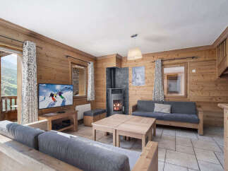 Experience the charm of this cozy living space, perfect for a mountain retreat.