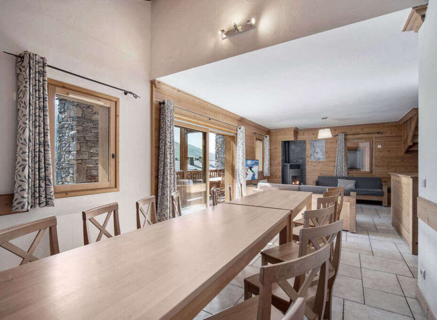 Experience the charm of this stunning property, featuring a spacious dining area perfect for gatherings.