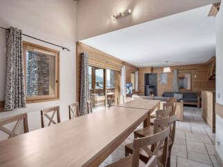 Experience the charm of this stunning property, featuring a spacious dining area perfect for gatherings.