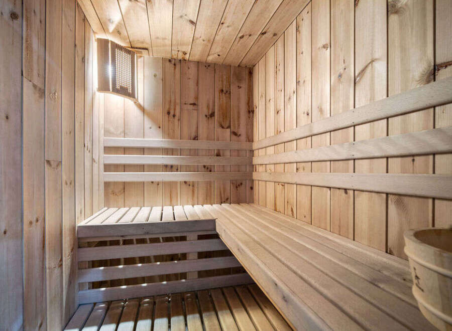 Step into relaxation with this stunning sauna, a perfect addition to any home seeking a touch of luxury and wellness.