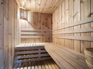 Step into relaxation with this stunning sauna, a perfect addition to any home seeking a touch of luxury and wellness.