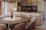 This stunning kitchen and dining area boasts a modern design with high-end finishes.