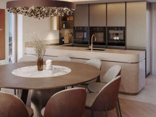 This stunning kitchen and dining area boasts a modern design with high-end finishes.
