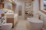 Experience luxury in this stunning bathroom featuring a modern design and high-end finishes.
