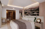 Experience luxury in this stunning bedroom, featuring a modern design and elegant finishes.