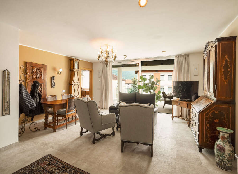 Step into this elegant living space, featuring a blend of classic and contemporary design.
