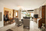 Step into this elegant living space, featuring a blend of classic and contemporary design.
