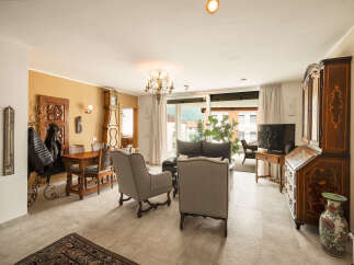 Step into this elegant living space, featuring a blend of classic and contemporary design.
