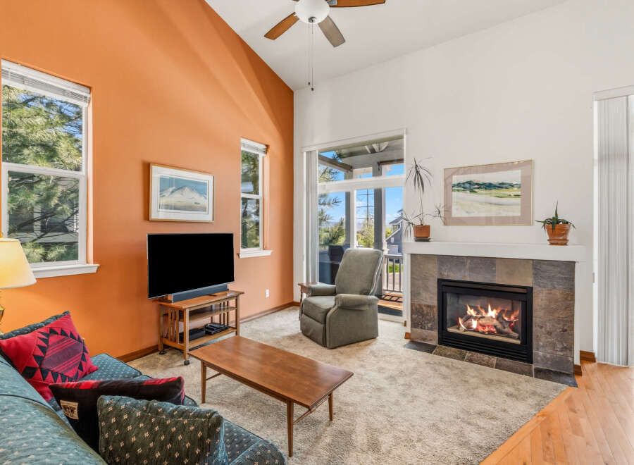 This inviting living room features a cozy fireplace, perfect for chilly evenings.
