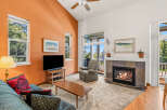This inviting living room features a cozy fireplace, perfect for chilly evenings.