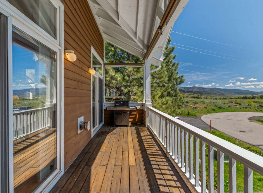 Enjoy breathtaking views from this stunning outdoor space! This property features a spacious deck, perfect for entertaining or relaxing.