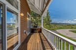 Enjoy breathtaking views from this stunning outdoor space! This property features a spacious deck, perfect for entertaining or relaxing.
