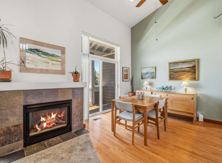 This stunning property features a cozy fireplace, perfect for those chilly evenings.