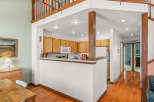 Step into this inviting home featuring a well-designed kitchen with ample cabinet space and modern appliances.