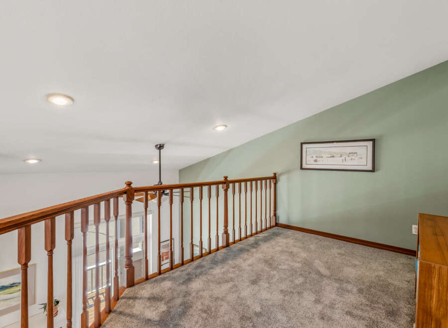 This stunning property boasts a spacious loft area, perfect for a home office or relaxation space.