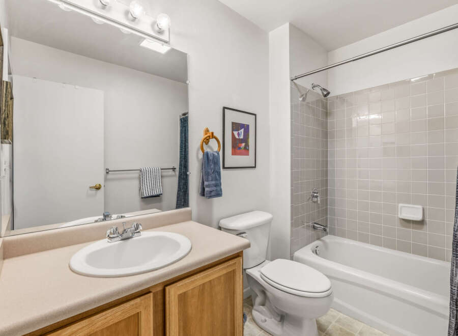 This bathroom features a clean and functional design, perfect for everyday use.