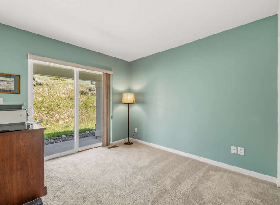 Step into this inviting room, featuring a serene color palette and ample natural light.