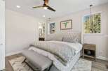 Step into this beautifully designed bedroom, featuring a plush bed, stylish decor, and ample natural light.