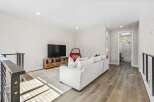Step into modern living with this stunning property, featuring a spacious living room perfect for entertaining.