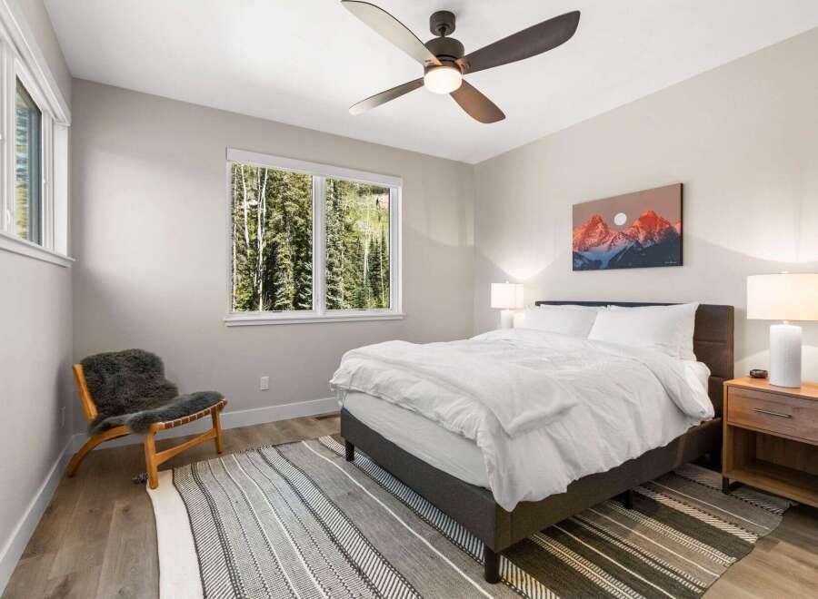 Step into a serene bedroom retreat, designed for ultimate comfort and relaxation.