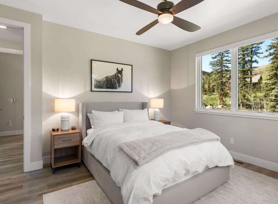 This stunning bedroom boasts a serene ambiance, perfect for relaxation.