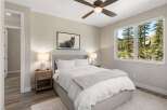 This stunning bedroom boasts a serene ambiance, perfect for relaxation.