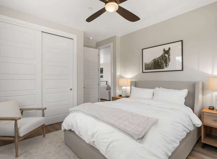 Step into this inviting bedroom, featuring a serene ambiance and modern design.