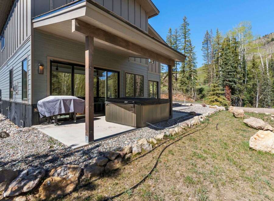 Enjoy the ultimate relaxation in this stunning property featuring a luxurious hot tub, perfect for unwinding after a long day.