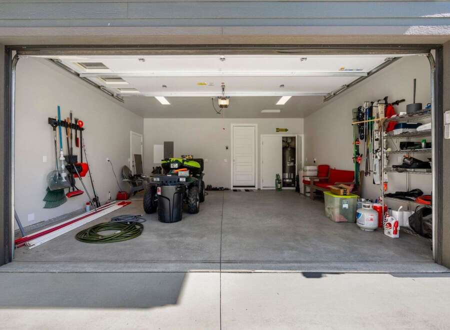Step into this spacious garage, perfect for storing vehicles, tools, and recreational equipment.