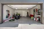 Step into this spacious garage, perfect for storing vehicles, tools, and recreational equipment.