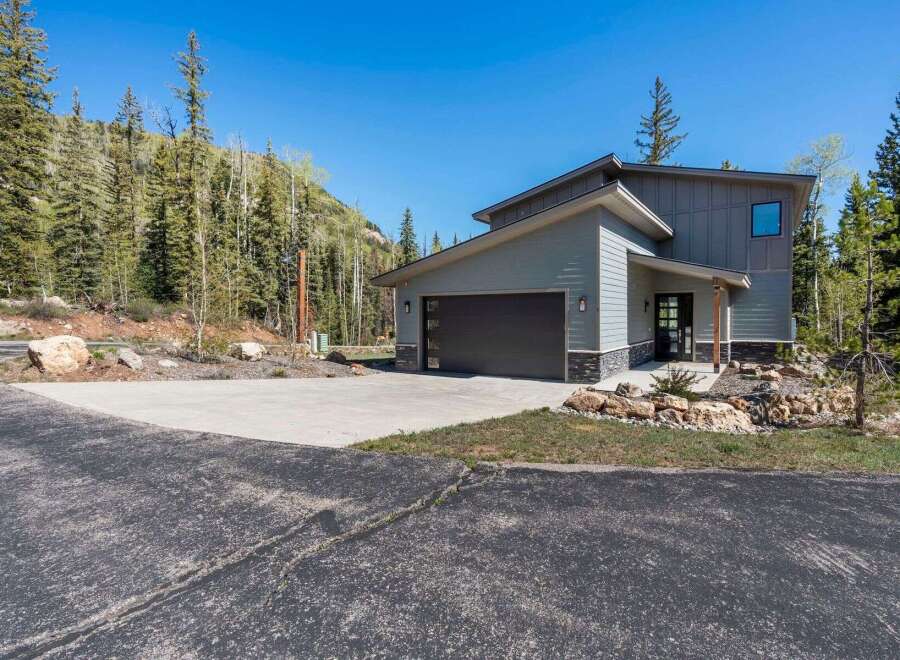 Discover your dream home nestled in a serene mountain setting.