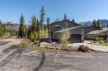 Discover your dream home in this stunning property! This modern residence boasts a sleek design, featuring a spacious garage and a beautifully landscaped yard.