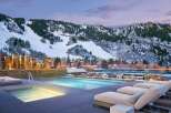 Experience luxury living with this stunning property featuring a rooftop pool and breathtaking mountain views.