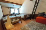 Discover a cozy retreat in this charming bedroom featuring two comfortable beds, perfect for a relaxing stay.