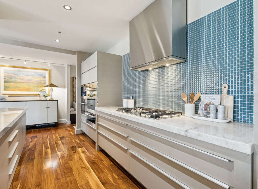 This stunning kitchen boasts modern design and high-end finishes.