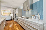 This stunning kitchen boasts modern design and high-end finishes.