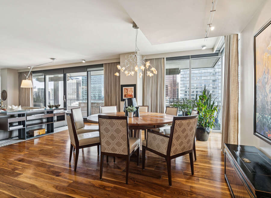 Experience luxury living in this stunning property, featuring a beautifully designed dining area.