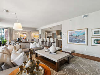 Experience luxury living in this stunning property, featuring a spacious open-concept design perfect for entertaining.