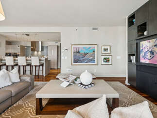 Step into luxury with this stunning living space, featuring a modern design and high-end finishes.
