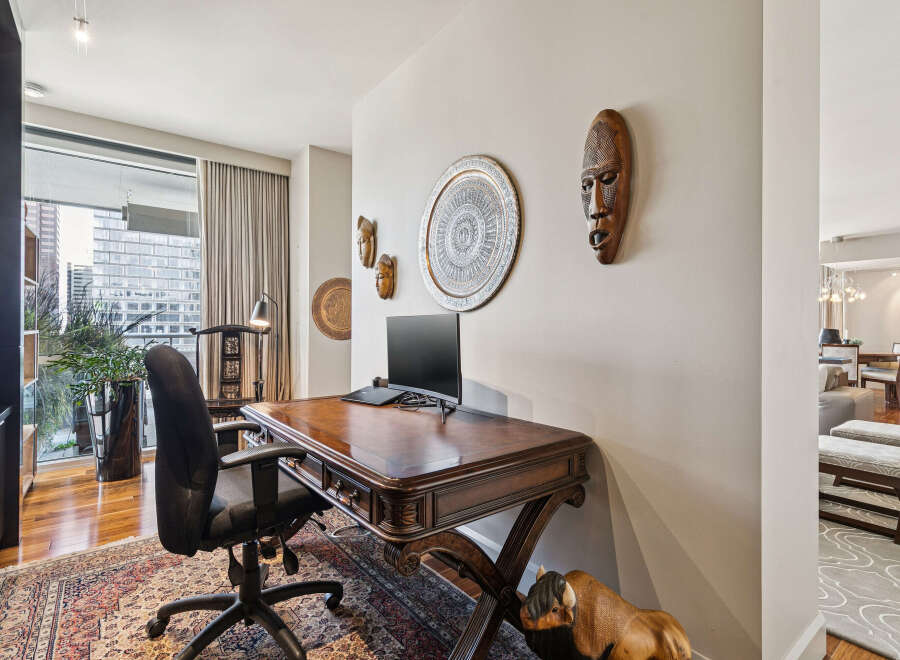 Discover the epitome of luxury and functionality in this stunning home office.