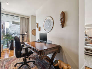 Discover the epitome of luxury and functionality in this stunning home office.