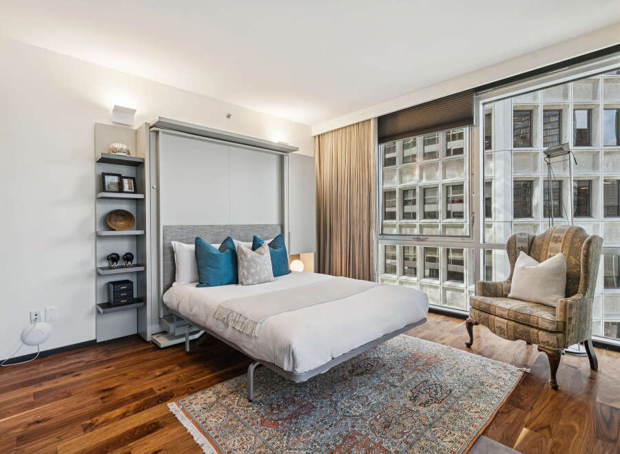 Experience urban living at its finest in this stylish bedroom.