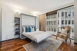 Experience urban living at its finest in this stylish bedroom.
