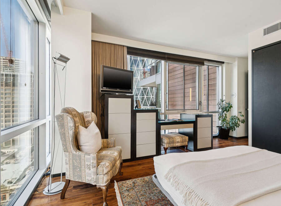 Experience luxury living in this stunning property, featuring expansive windows that flood the space with natural light and offer breathtaking city views.