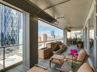 Experience luxury living with this stunning balcony offering breathtaking city views.