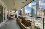 Enjoy breathtaking city views from this stunning balcony.