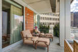 Enjoy breathtaking city views from this stunning balcony.