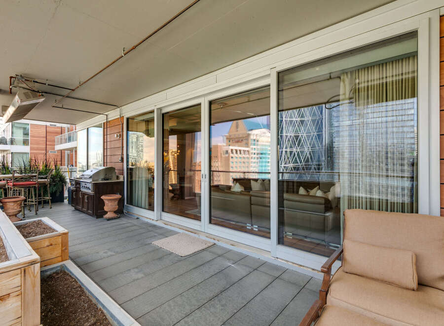 Enjoy luxurious outdoor living in this stunning condo with a spacious balcony.